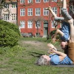 Tatjana t'Felt and her son Adam demonstrating acroyoga for families.
Photography by Emily Wilson Photography