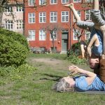 Tatjana t'Felt and her son Adam demonstrating acroyoga for families.
Photography by Emily Wilson Photography