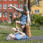 Tatjana t'Felt and her son Adam demonstrating acroyoga for families.
Photography by Emily Wilson Photography