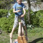 Tatjana t'Felt and her son Adam demonstrating acroyoga for families.
Photography by Emily Wilson Photography