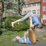 Tatjana t'Felt and her son Adam demonstrating acroyoga for families.
Photography by Emily Wilson Photography