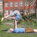 Tatjana t'Felt and her son Adam demonstrating acroyoga for families.
Photography by Emily Wilson Photography