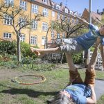 Tatjana t'Felt and her son Adam demonstrating acroyoga for families.
Photography by Emily Wilson Photography